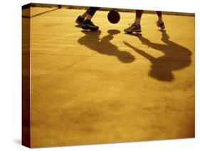 Low Section View of Two People Playing Basketball-null-Stretched Canvas