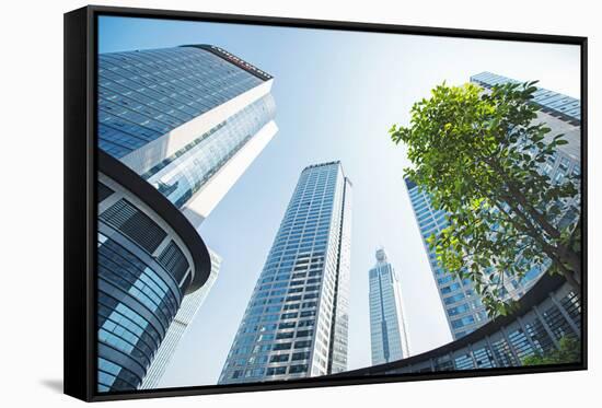 Low Wide Angle View of a Group of New Skyscrapers Combined with Fresh Greenery in Jianggan-Andreas Brandl-Framed Stretched Canvas