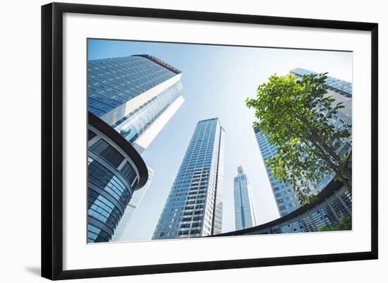 Low Wide Angle View of a Group of New Skyscrapers Combined with Fresh Greenery in Jianggan-Andreas Brandl-Framed Photographic Print