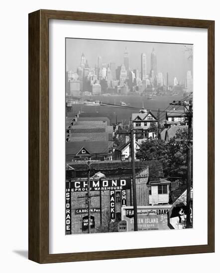 Lower Manhattan and Ferry Docks with Aid of a Telephoto Lens over the Rooftops in Staten Island-Andreas Feininger-Framed Photographic Print