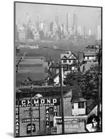 Lower Manhattan and Ferry Docks with Aid of a Telephoto Lens over the Rooftops in Staten Island-Andreas Feininger-Mounted Photographic Print
