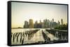 Lower Manhattan skyline across the East River at sunset, New York City, New York, United States of -Fraser Hall-Framed Stretched Canvas