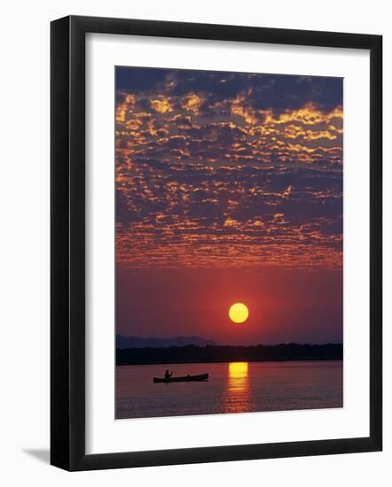 Lower Zambesi National Park, Canoeing on the Zambezi River at Sun Rise under a Mackerel Sky, Zambia-John Warburton-lee-Framed Photographic Print