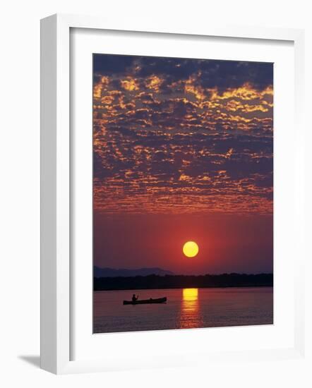 Lower Zambesi National Park, Canoeing on the Zambezi River at Sun Rise under a Mackerel Sky, Zambia-John Warburton-lee-Framed Photographic Print