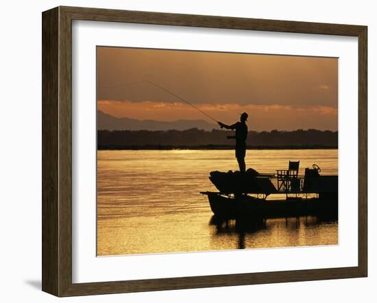 Lower Zambezi National Park, Fly Fishing for Tiger Fish from a Barge on the Zambezi River at Dawn, -John Warburton-lee-Framed Photographic Print