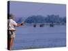 Lower Zambezi National Park, Fly-Fishing for Tiger Fish on the Zambezi River Against a Backdrop of -John Warburton-lee-Stretched Canvas