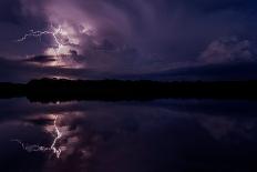 Lightning storm reflecting in river in the Amazon basin, Ecuador-Lucas Bustamante-Photographic Print