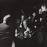 A chess game during intermission at the artists lobby Carnegie Hall, 1940-Lucien Aigner-Mounted Photographic Print