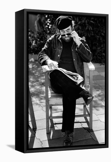 Lucio Dalla Looks Towards the Photographer Removing His Glasses-null-Framed Stretched Canvas