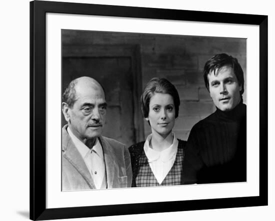 Luis Bunuel, Catherine Deneuve and Franco Nero during filming of 'Tristana', 1970 (b/w photo)-null-Framed Photo