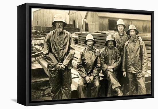 Lumberyard Workers in Rain Gear-null-Framed Stretched Canvas