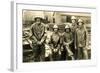 Lumberyard Workers in Rain Gear-null-Framed Art Print