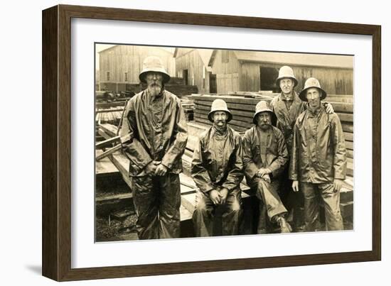Lumberyard Workers in Rain Gear-null-Framed Art Print