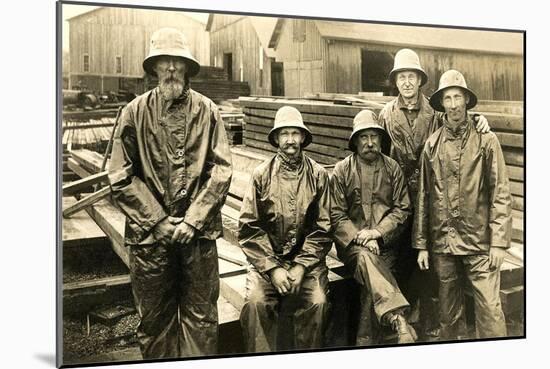 Lumberyard Workers in Rain Gear-null-Mounted Art Print