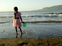 A Girl Walks on the Beach in Jacmel, Haiti, in This February 5, 2001-Lynne Sladky-Framed Premium Photographic Print