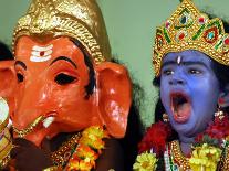 A Child Dressed as Hindu God Krishna Yawns, Chennai, India, September 22, 2006-M. Lakshman-Premium Photographic Print