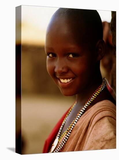 Maasai Girl, Masai Mara National Reserve, Kenya-Tom Cockrem-Stretched Canvas