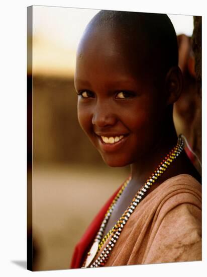 Maasai Girl, Masai Mara National Reserve, Kenya-Tom Cockrem-Stretched Canvas