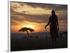 Maasai Tribesman Carrying a Stick on the Savannah at Sunset, Maasai Mara National Reserve, Kenya-Keren Su-Framed Photographic Print