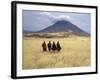 Maasai Warriors Stride across Golden Grass Plains at Foot of Ol Doinyo Lengai, 'Mountain of God'-Nigel Pavitt-Framed Photographic Print