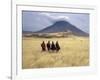 Maasai Warriors Stride across Golden Grass Plains at Foot of Ol Doinyo Lengai, 'Mountain of God'-Nigel Pavitt-Framed Photographic Print