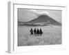 Maasai Warriors Stride across Golden Grass Plains at Foot of Ol Doinyo Lengai, 'Mountain of God'-Nigel Pavitt-Framed Premium Photographic Print