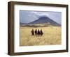 Maasai Warriors Stride across Golden Grass Plains at Foot of Ol Doinyo Lengai, 'Mountain of God'-Nigel Pavitt-Framed Photographic Print