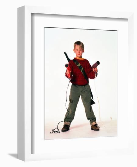 MACAULAY CULKIN. "HOME ALONE" [1990], directed by CHRIS COLUMBUS.-null-Framed Photographic Print