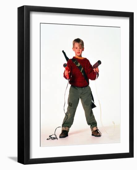 MACAULAY CULKIN. "HOME ALONE" [1990], directed by CHRIS COLUMBUS.-null-Framed Photographic Print