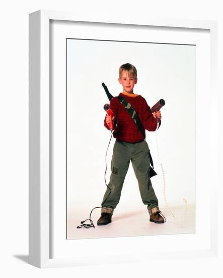MACAULAY CULKIN. "HOME ALONE" [1990], directed by CHRIS COLUMBUS.-null-Framed Photographic Print