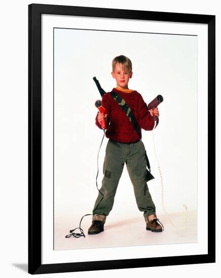 MACAULAY CULKIN. "HOME ALONE" [1990], directed by CHRIS COLUMBUS.-null-Framed Photographic Print