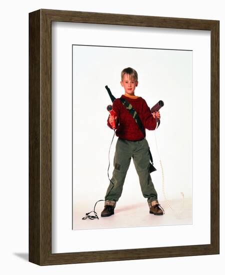 MACAULAY CULKIN. "HOME ALONE" [1990], directed by CHRIS COLUMBUS.-null-Framed Photographic Print