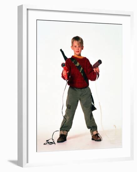 MACAULAY CULKIN. "HOME ALONE" [1990], directed by CHRIS COLUMBUS.-null-Framed Premium Photographic Print