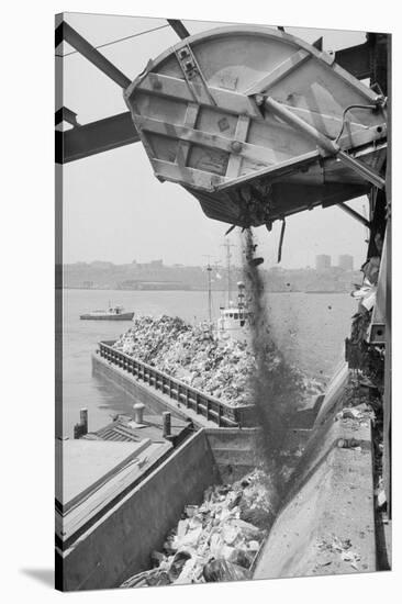 Machine Loading Garbage onto Barge-Harry Leder-Stretched Canvas