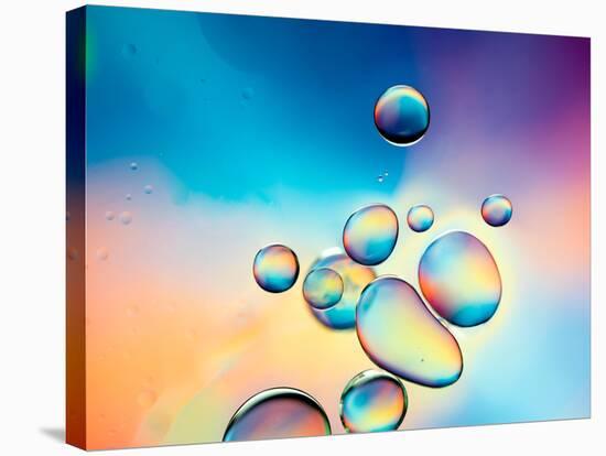 Macro of Oil Drops on Water Surface with Vibrant Colors in Background-Abstract Oil Work-Stretched Canvas