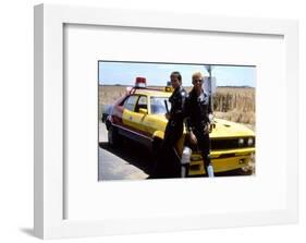 MAD MAX, 1979 directed by GEORGE MILLER Mel Gibson and Steve Bisley (photo)-null-Framed Photo