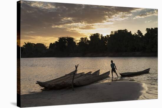 Madagascar, Beopaka, Pirogues at Dusk on Manambolo River-Roberto Cattini-Stretched Canvas