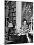 Madam Elsa Schiaparelli Enjoying Her Study Which is Filled with Treasures, Paintings, and Books-Hans Wild-Mounted Premium Photographic Print