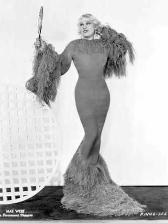 'Mae West standing in Classic Long Gown' Photo - Movie Star News