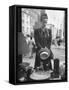 Maeve Brennan of Harper's Bazaar Looking Through Store Window-Nina Leen-Framed Stretched Canvas