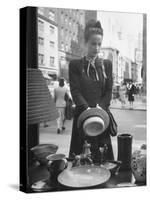 Maeve Brennan of Harper's Bazaar Looking Through Store Window-Nina Leen-Stretched Canvas