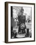 Maeve Brennan of Harper's Bazaar Looking Through Store Window-Nina Leen-Framed Photographic Print