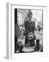 Maeve Brennan of Harper's Bazaar Looking Through Store Window-Nina Leen-Framed Photographic Print