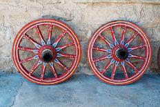 Wagon Wheel . Close-Up of an Antique Wagon Wheel Located in A Fortress.-maggee-Photographic Print