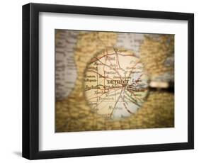 Magnifying Glass In Front Of A Detroit Map-gemenacom-Framed Art Print