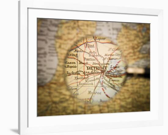 Magnifying Glass In Front Of A Detroit Map-gemenacom-Framed Art Print