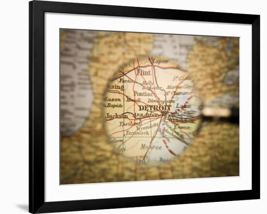 Magnifying Glass In Front Of A Detroit Map-gemenacom-Framed Art Print