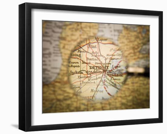 Magnifying Glass In Front Of A Detroit Map-gemenacom-Framed Art Print