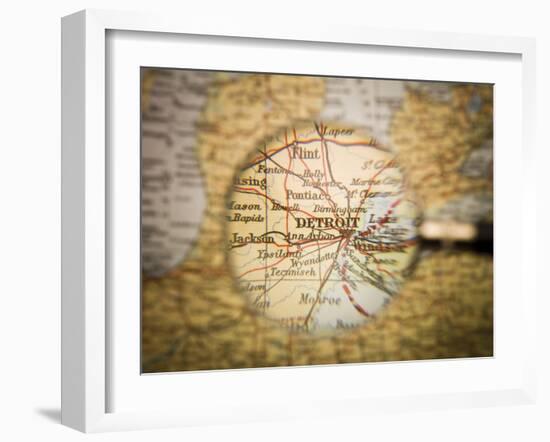 Magnifying Glass In Front Of A Detroit Map-gemenacom-Framed Art Print