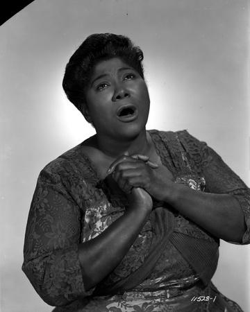 https://imgc.allpostersimages.com/img/posters/mahalia-jackson-singing-in-floral-blouse-with-white-background_u-L-Q115D5U0.jpg?artPerspective=n